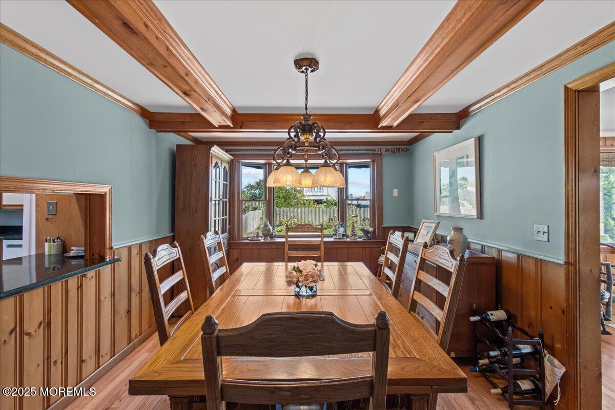 262 Sunset Lane Mantoloking, NJ 08738 - Photo 10 of 45 a view of a dining room with furniture window and outside view