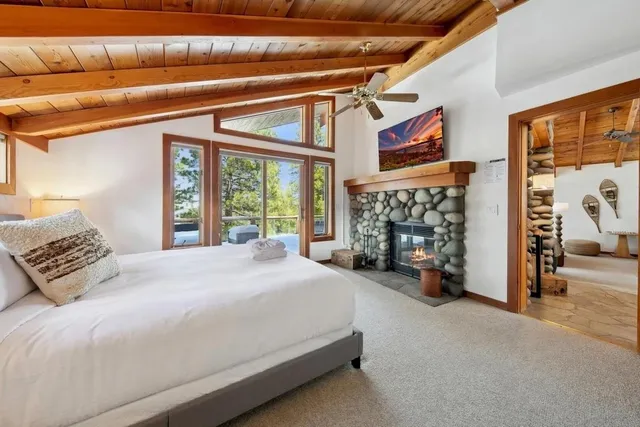 a spacious bathroom with a double vanity sink and a mirror