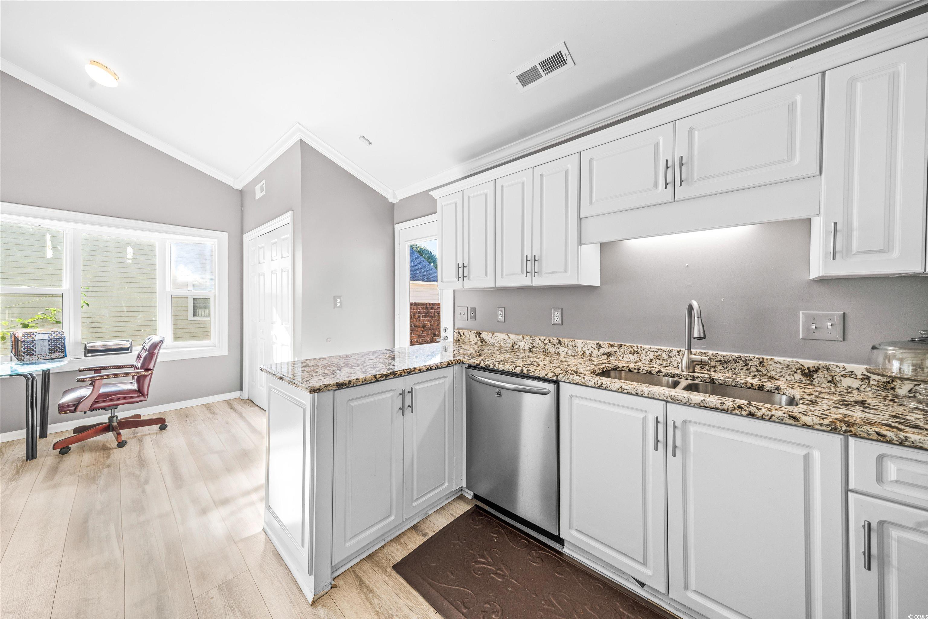 366 Pilothouse Drive Myrtle Beach, SC 29577 - Photo 11 of 40 Kitchen featuring lofted ceiling, sink, stainless