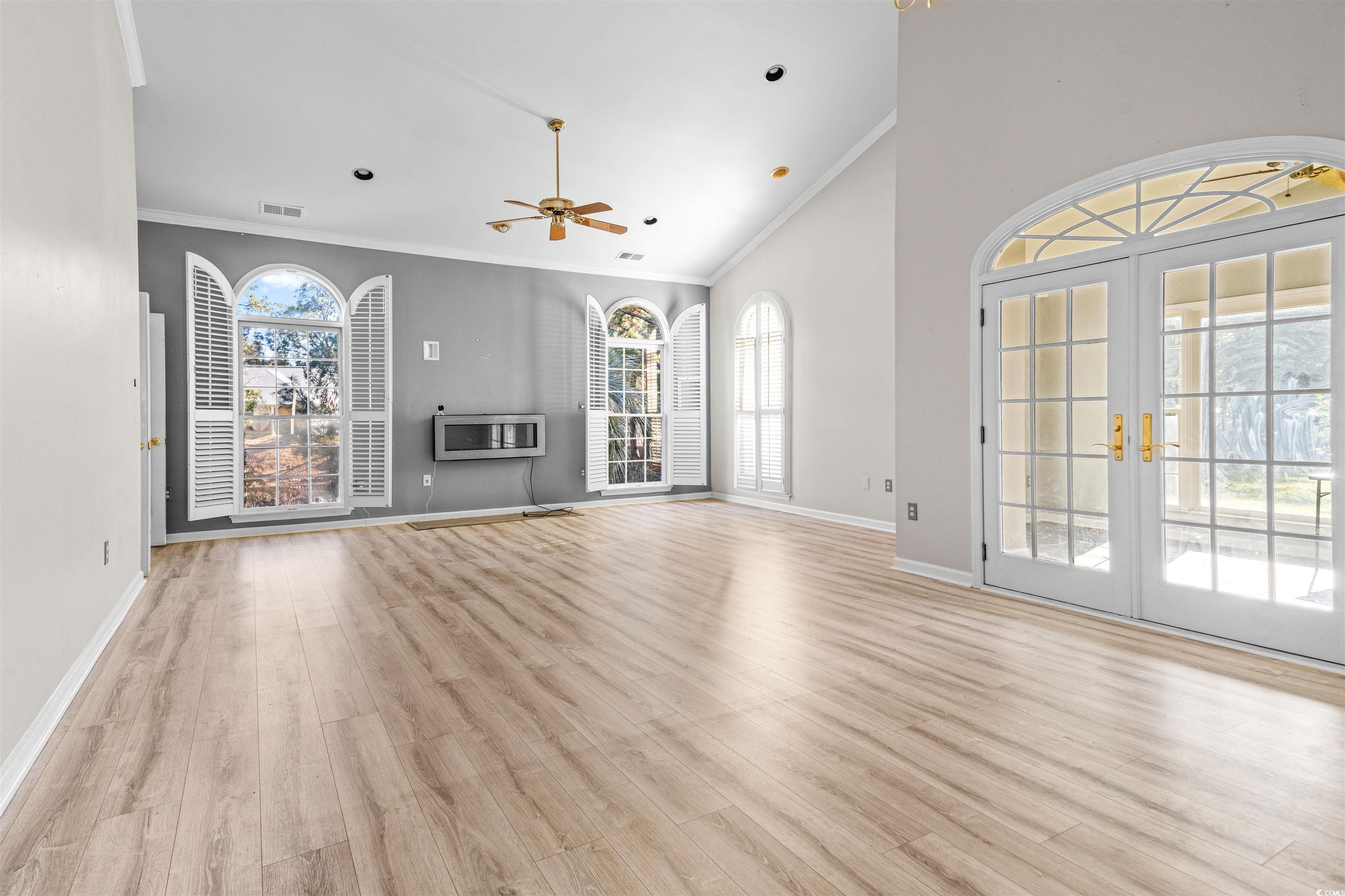 366 Pilothouse Drive Myrtle Beach, SC 29577 - Photo 3 of 40 Unfurnished living room with plenty of natural lig
