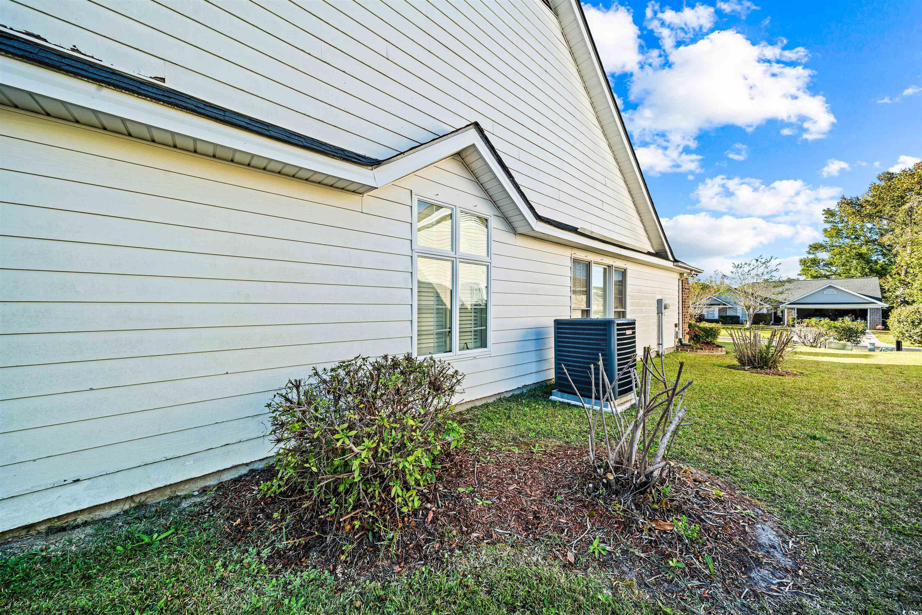 366 Pilothouse Drive Myrtle Beach, SC 29577 - Photo 36 of 40 View of home's exterior with a lawn