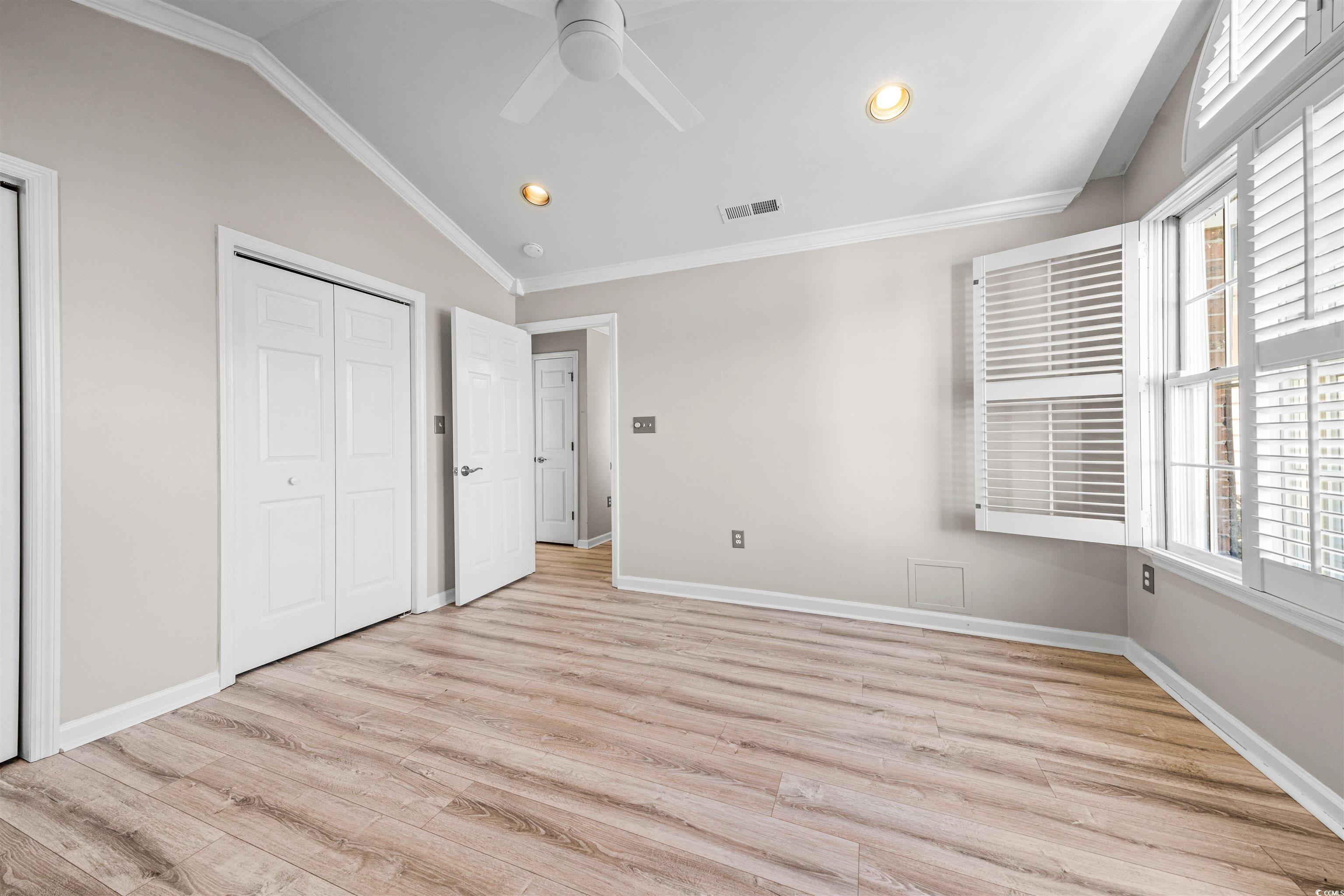 366 Pilothouse Drive Myrtle Beach, SC 29577 - Photo 5 of 40 Unfurnished bedroom featuring lofted ceiling, ligh