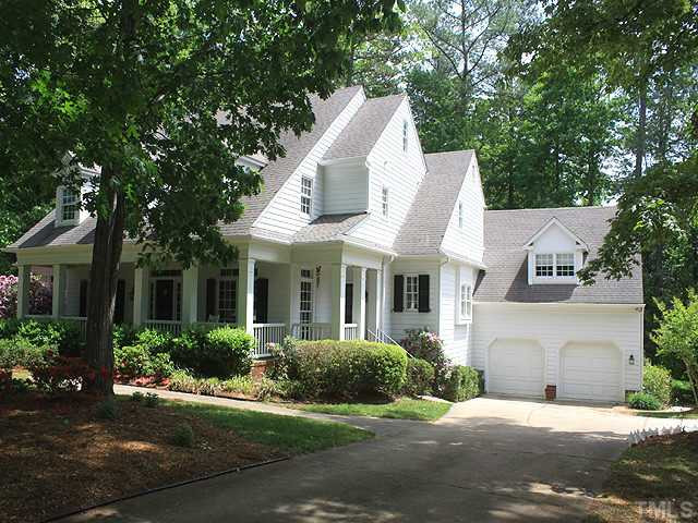 Another view of the front of the home. Note the large front porch. Complete with ceiling fans, this porch could be your favorite afternoon retreat! Facade/Exterior Front