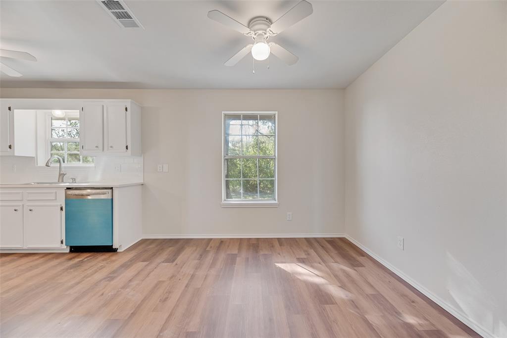 751 County Road 1240 Mount Pleasant, TX 75455 - Photo 17 of 35 wooden floor in an empty room with a window