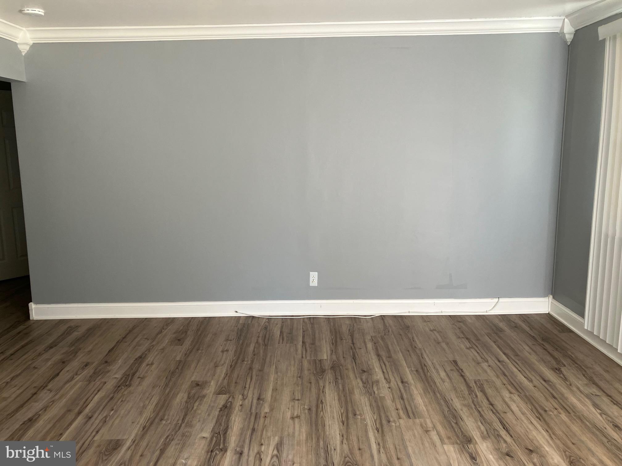 928 Pemberton - Browns Mills Road Pemberton, NJ 08068 - Photo 2 of 10 a view of an empty room with wooden floor