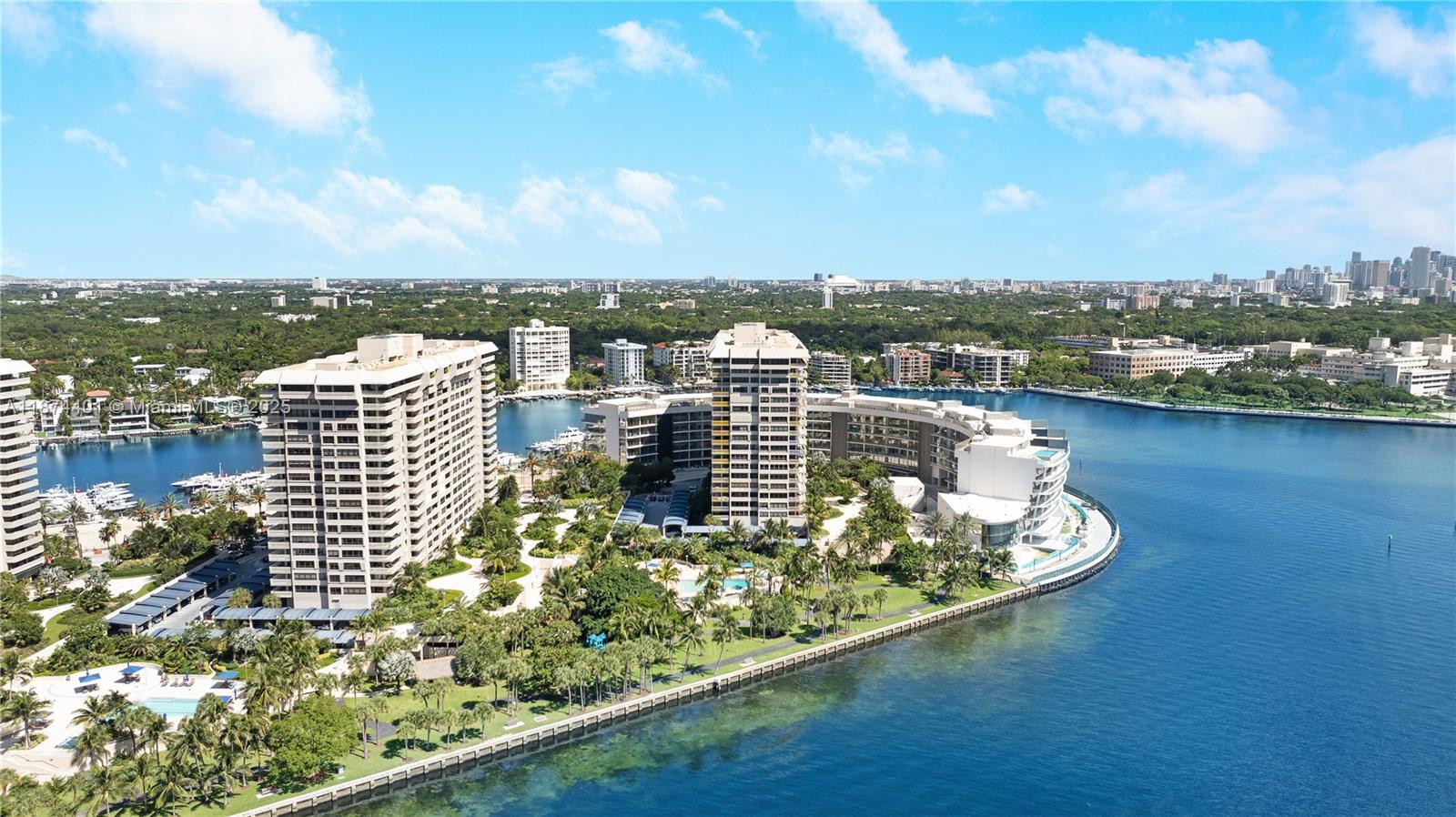 3 Grove Isle Drive, Unit C1108 Miami, FL 33133 - Photo 29 of 29 a view of a lake with tall buildings