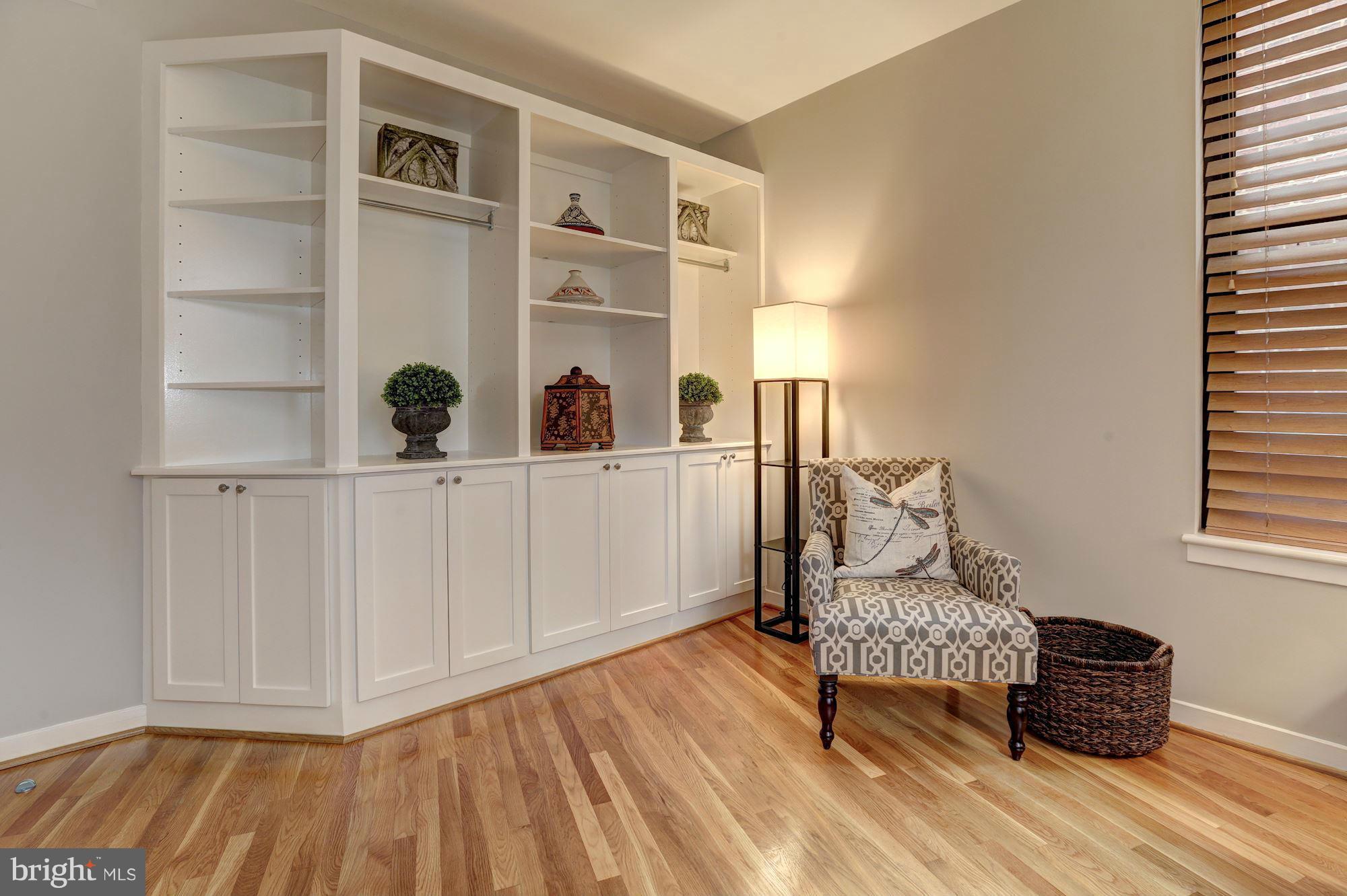3 Washington Circle Northwest, Unit 103 Washington, DC 20037 - Photo 12 of 28 a living room with furniture and a window