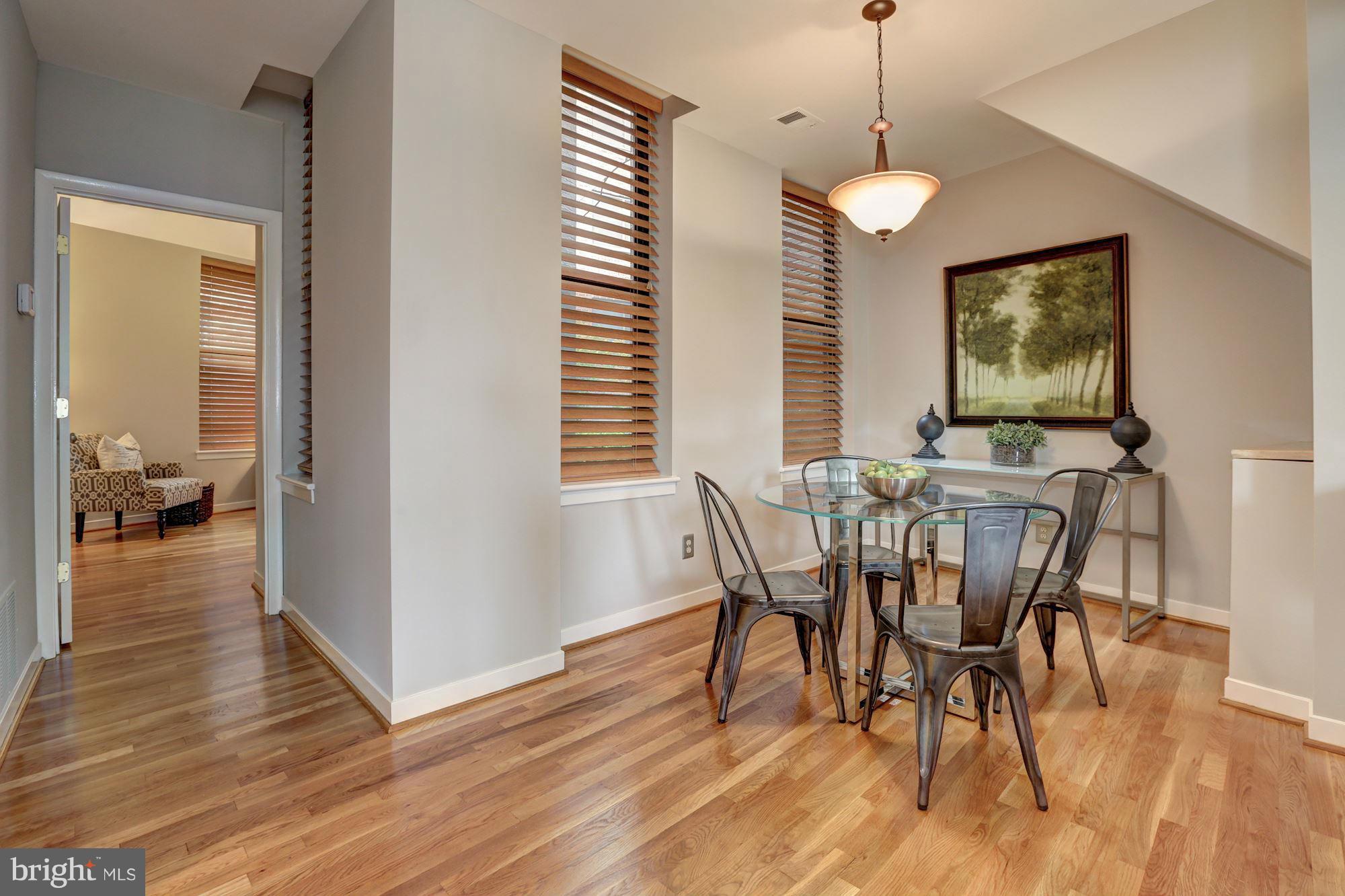 3 Washington Circle Northwest, Unit 103 Washington, DC 20037 - Photo 6 of 28 a view of a dining room with furniture window and wooden floor