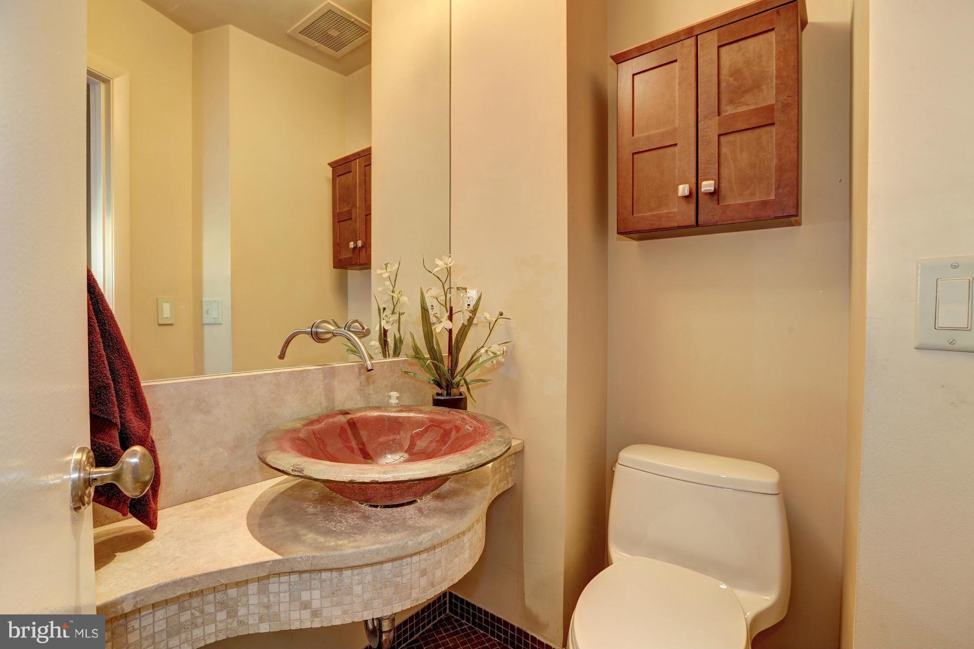 3 Washington Circle Northwest, Unit 103 Washington, DC 20037 - Photo 10 of 28 a bathroom with a toilet and a sink