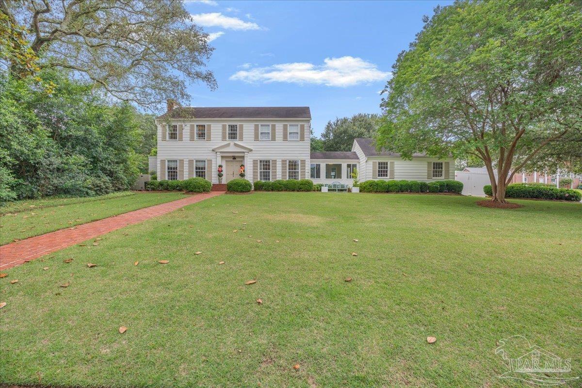 3361 Palermo Road Pensacola, FL 32503 - Photo 11 of 50 a view of a house with a big yard and large trees