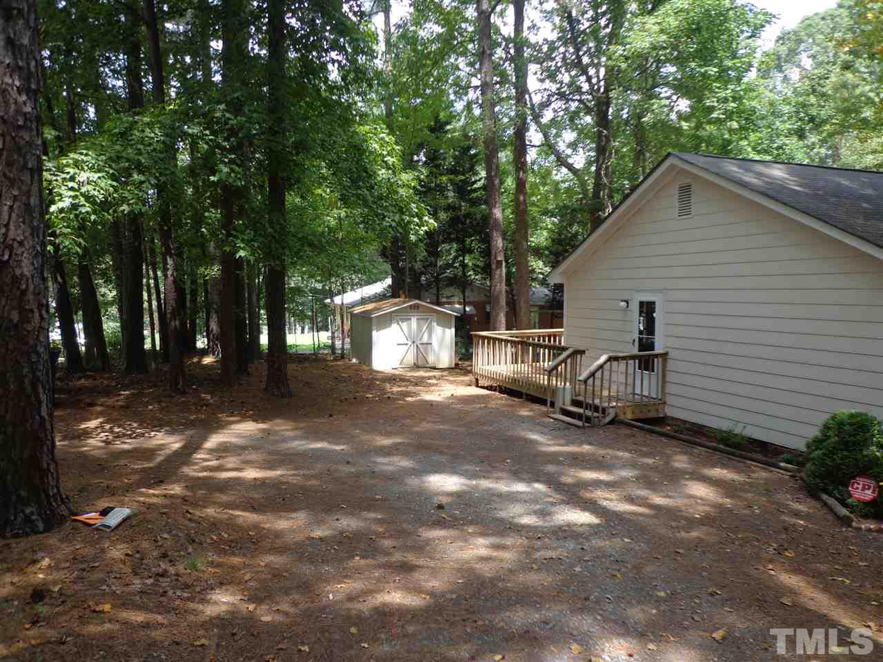 3616 Lynn Road Raleigh, NC 27613 - Photo 2 of 12 a view of a outdoor space with porch and garden