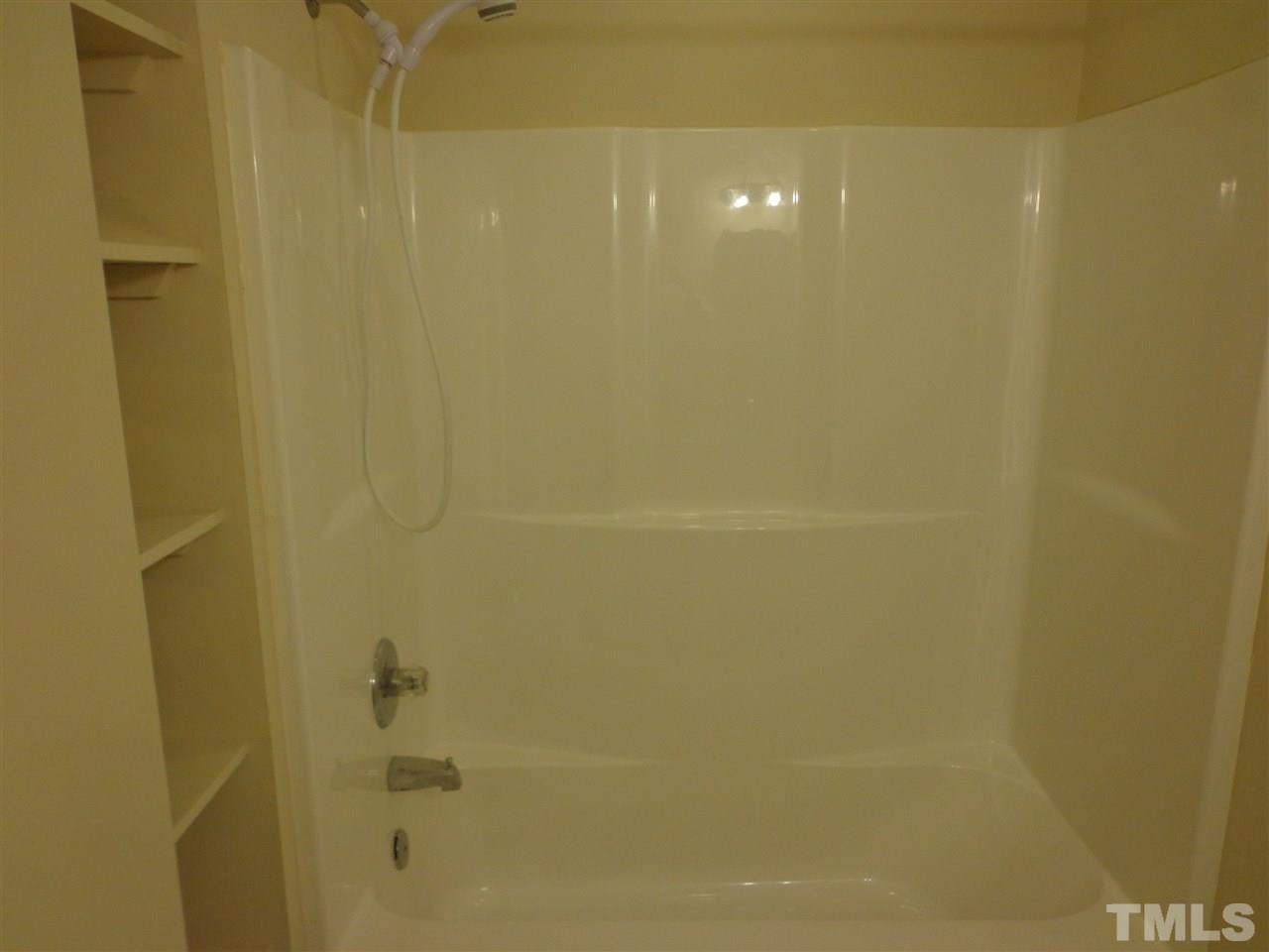 3616 Lynn Road Raleigh, NC 27613 - Photo 12 of 12 a bathroom with a shower