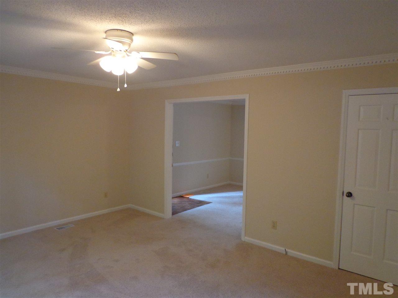 3616 Lynn Road Raleigh, NC 27613 - Photo 9 of 12 wooden floor in an empty room