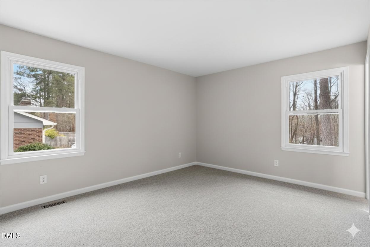 3457 Hope Valley Road Durham, NC 27707 - Photo 17 of 24 an empty room with windows