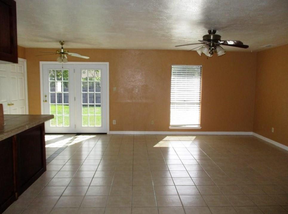 1201 Independence Trail Grand Prairie, TX 75052 - Photo 4 of 24 a view of an empty room with a window
