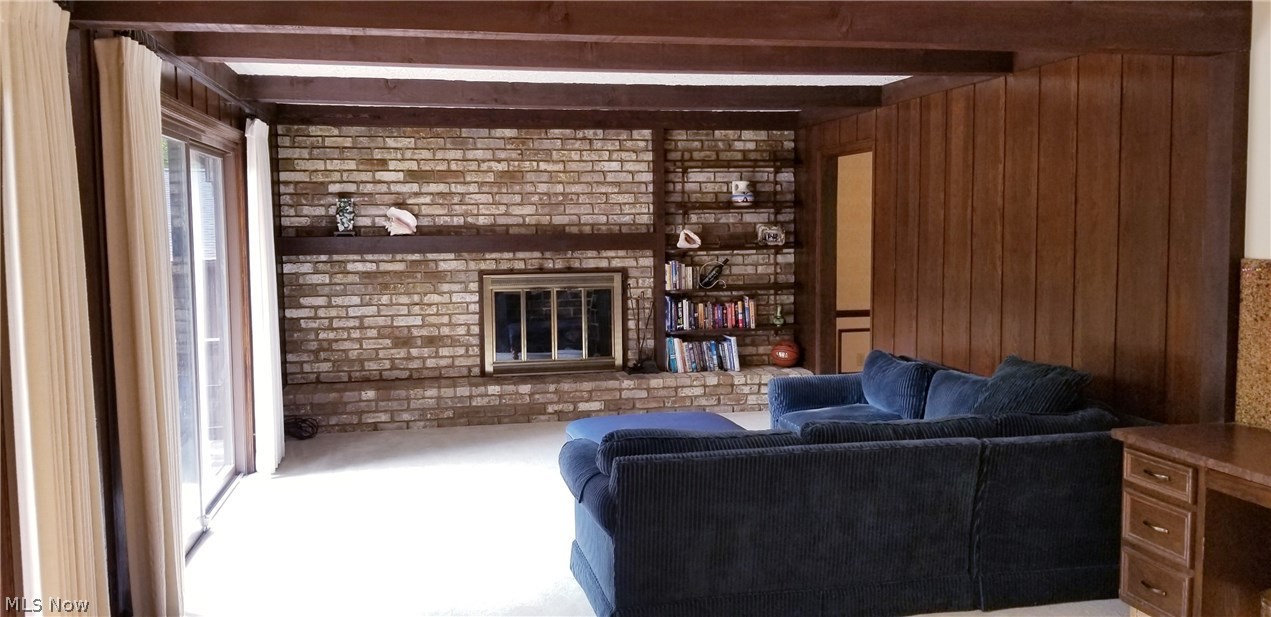 1261 Sand Run Road Akron, OH 44313 - Photo 15 of 32 Relax in the family room just off the kitchen. Imagine a fire burning in the evenings, sliders open, listening to the sounds of nature.