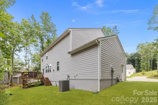 a view of a park with large trees