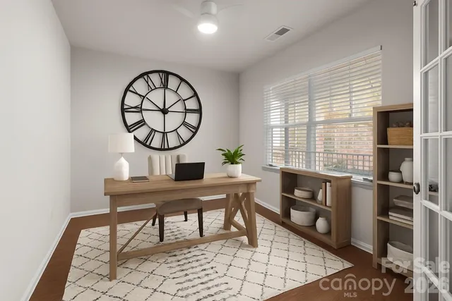 a view of a workspace with furniture