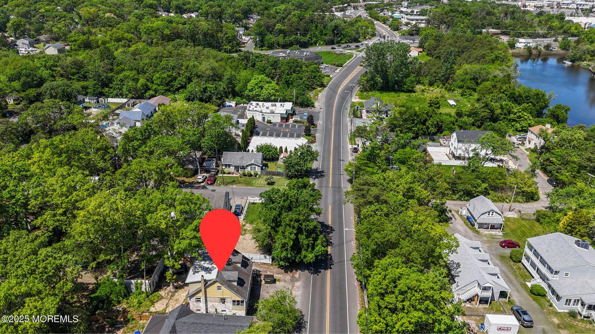 849 Mantoloking Road Brick, NJ 08723 - Photo 5 of 10 an aerial view of house with yard swimming pool and outdoor seating