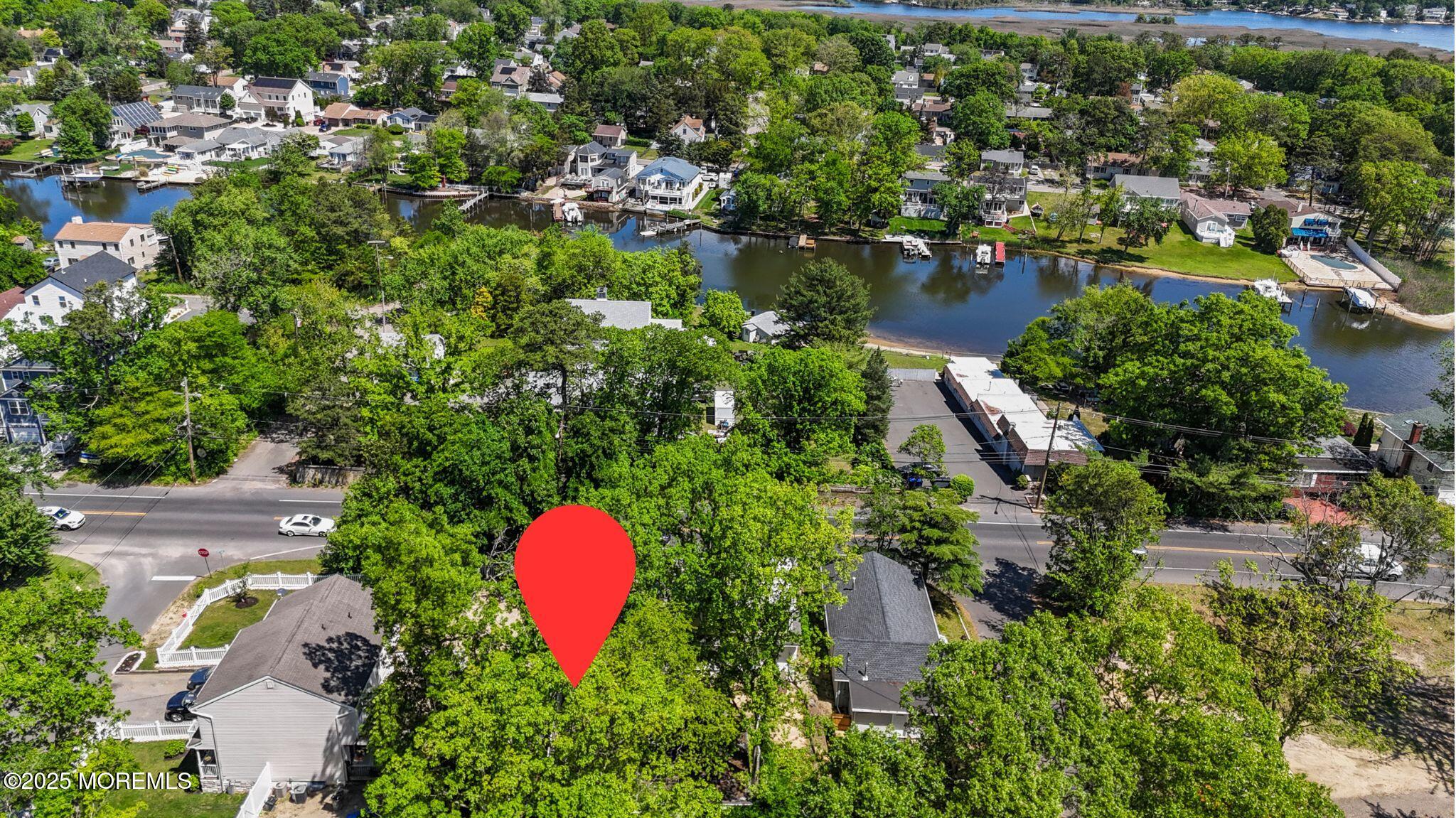 849 Mantoloking Road Brick, NJ 08723 - Photo 7 of 10 an aerial view of residential house with outdoor space and swimming pool