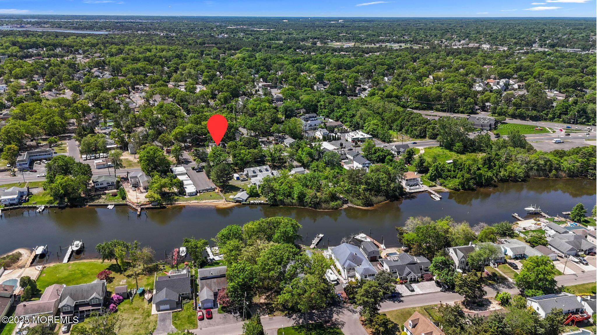 849 Mantoloking Road Brick, NJ 08723 - Photo 8 of 10 an aerial view of residential houses with outdoor space and lake view
