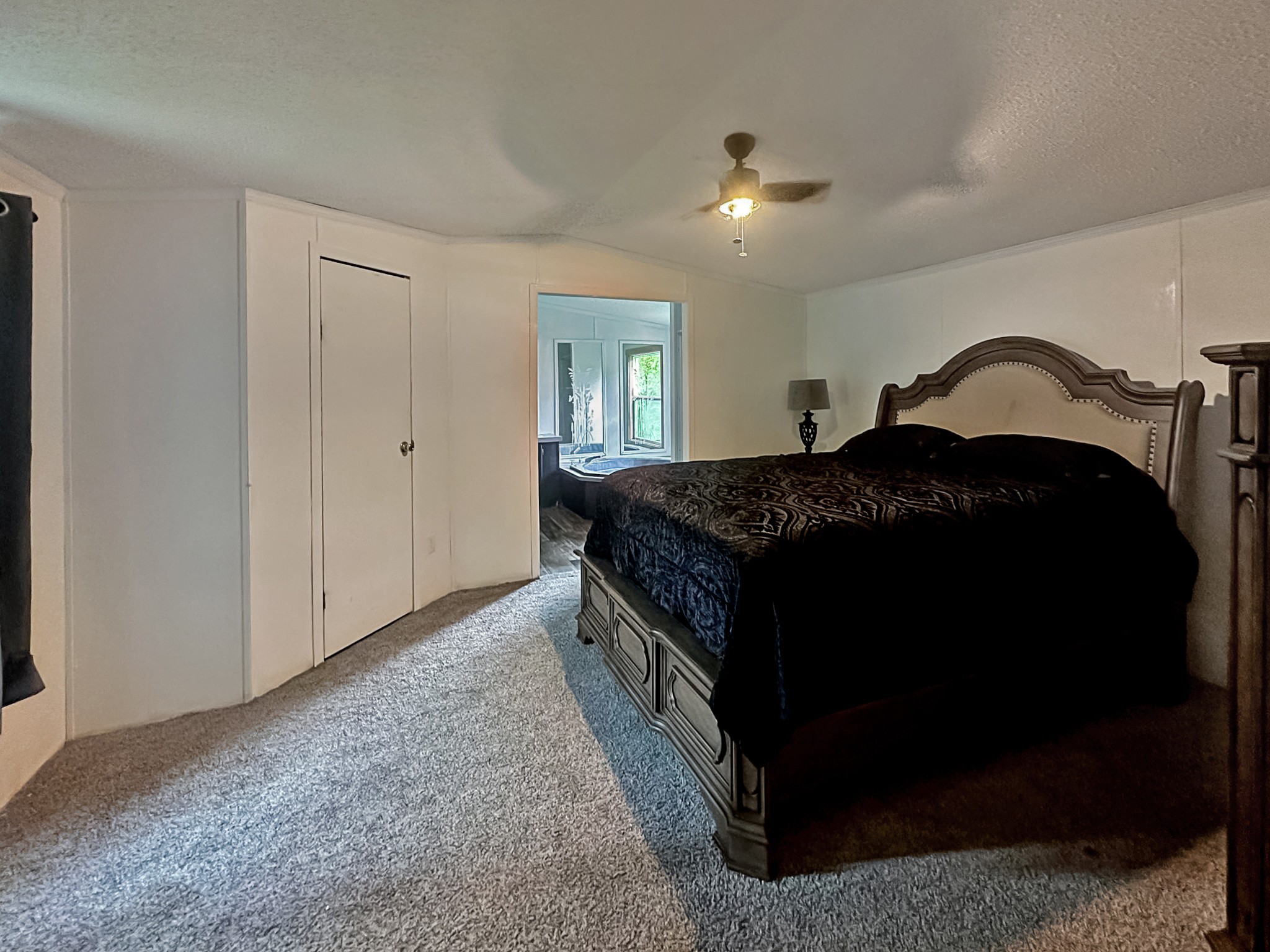 131 Maynard Avenue Jamestown, TN 38556 - Photo 24 of 59 a bedroom with a bed and a night stand