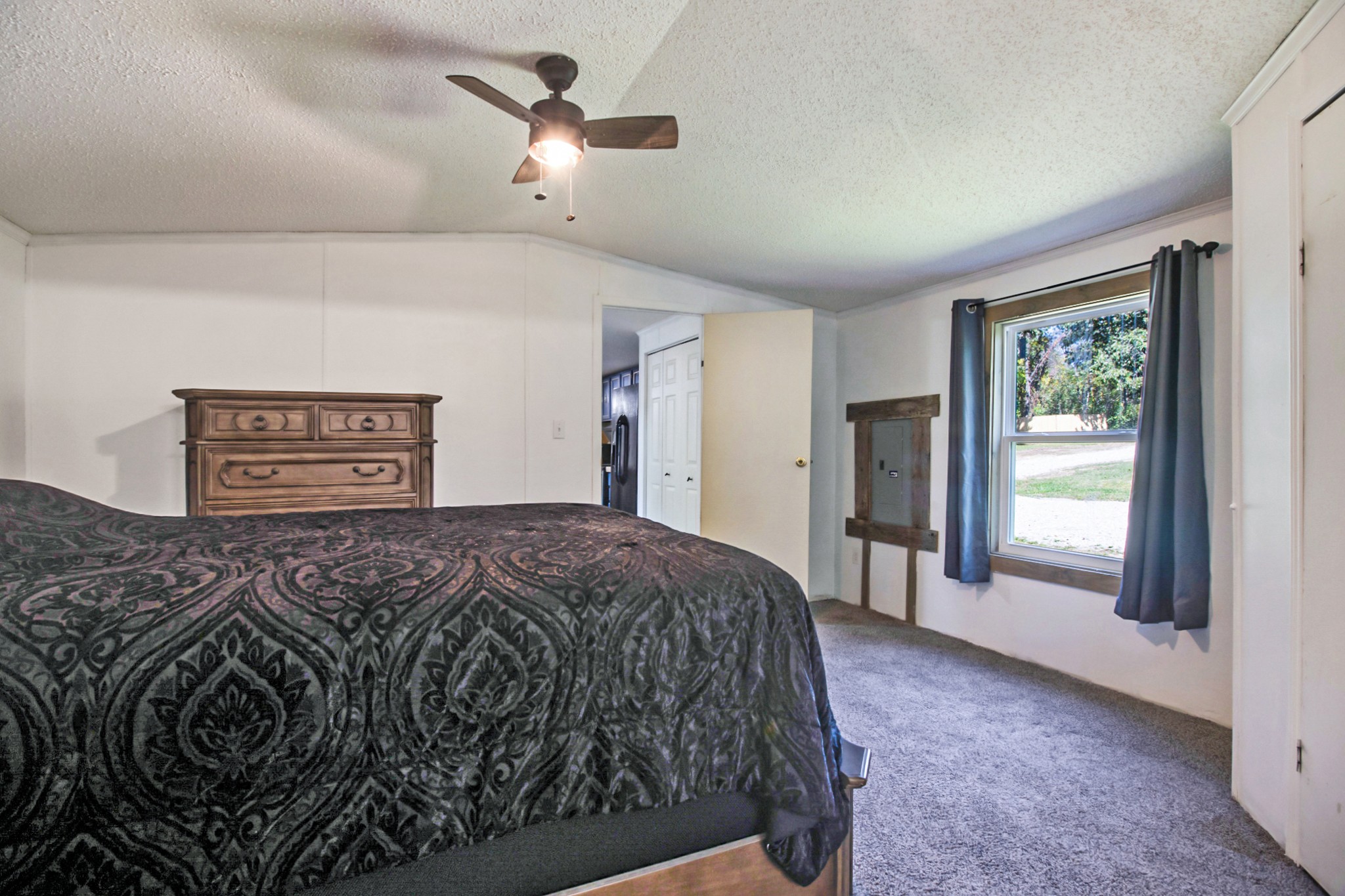 131 Maynard Avenue Jamestown, TN 38556 - Photo 26 of 59 a bedroom with a large bed and a window