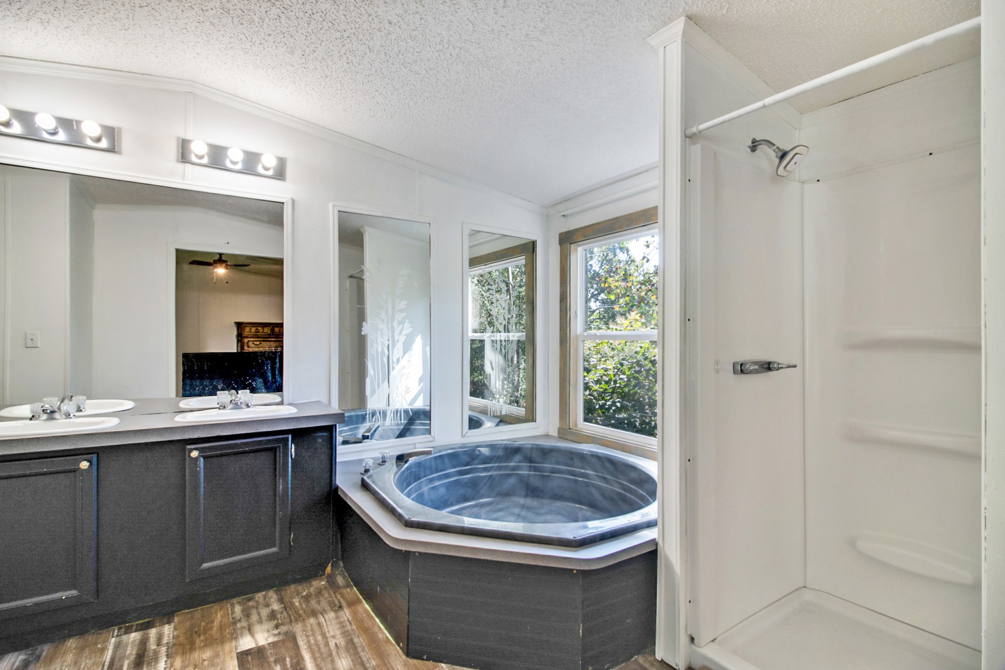 131 Maynard Avenue Jamestown, TN 38556 - Photo 27 of 59 a bathroom with a sink a toilet a mirror and shower