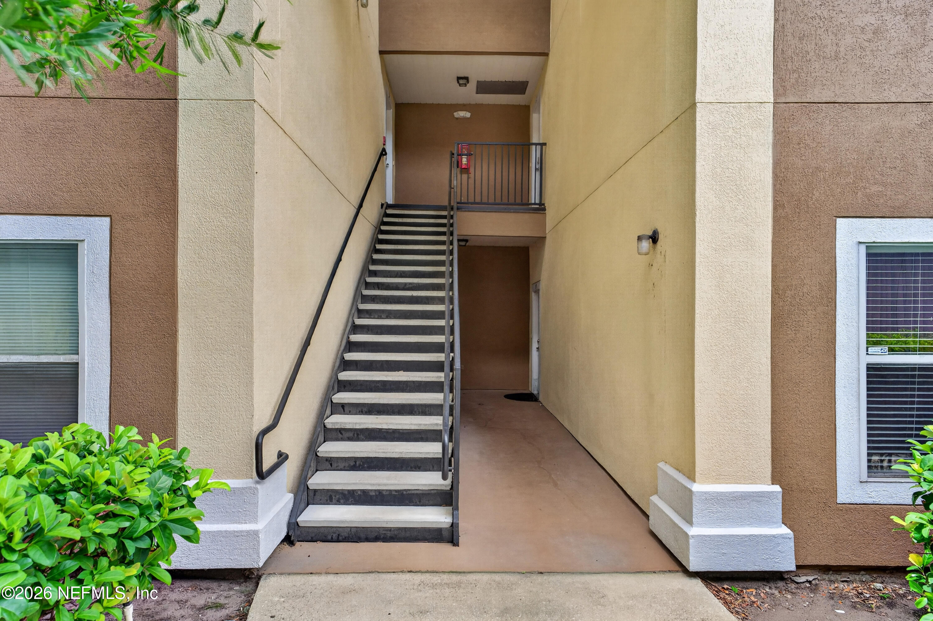 7920 Merrill Road, Unit 615 Jacksonville, FL 32277 - Photo 3 of 26 Stairs to second floor
