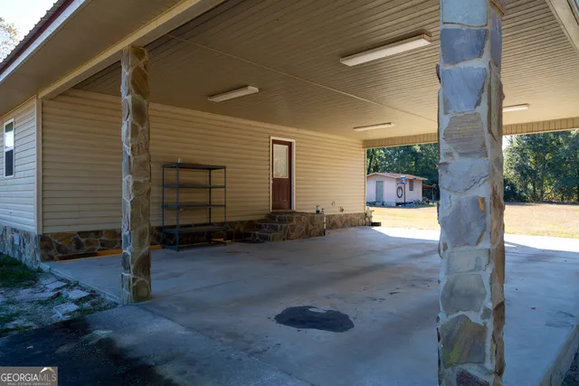 a view of backyard and porch