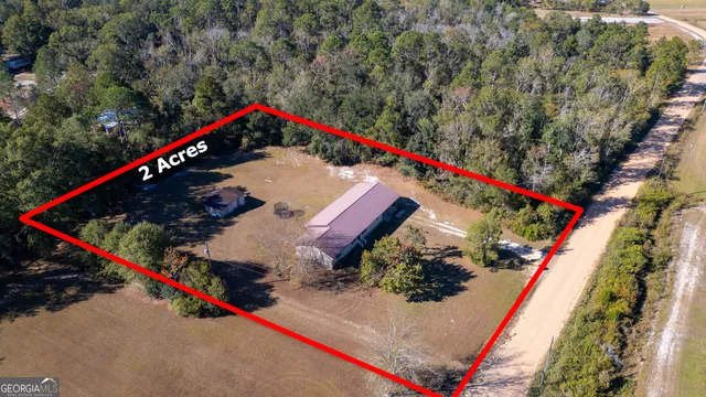 a view of a brick house with a large window
