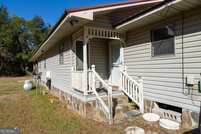 a view of a porch with furniture