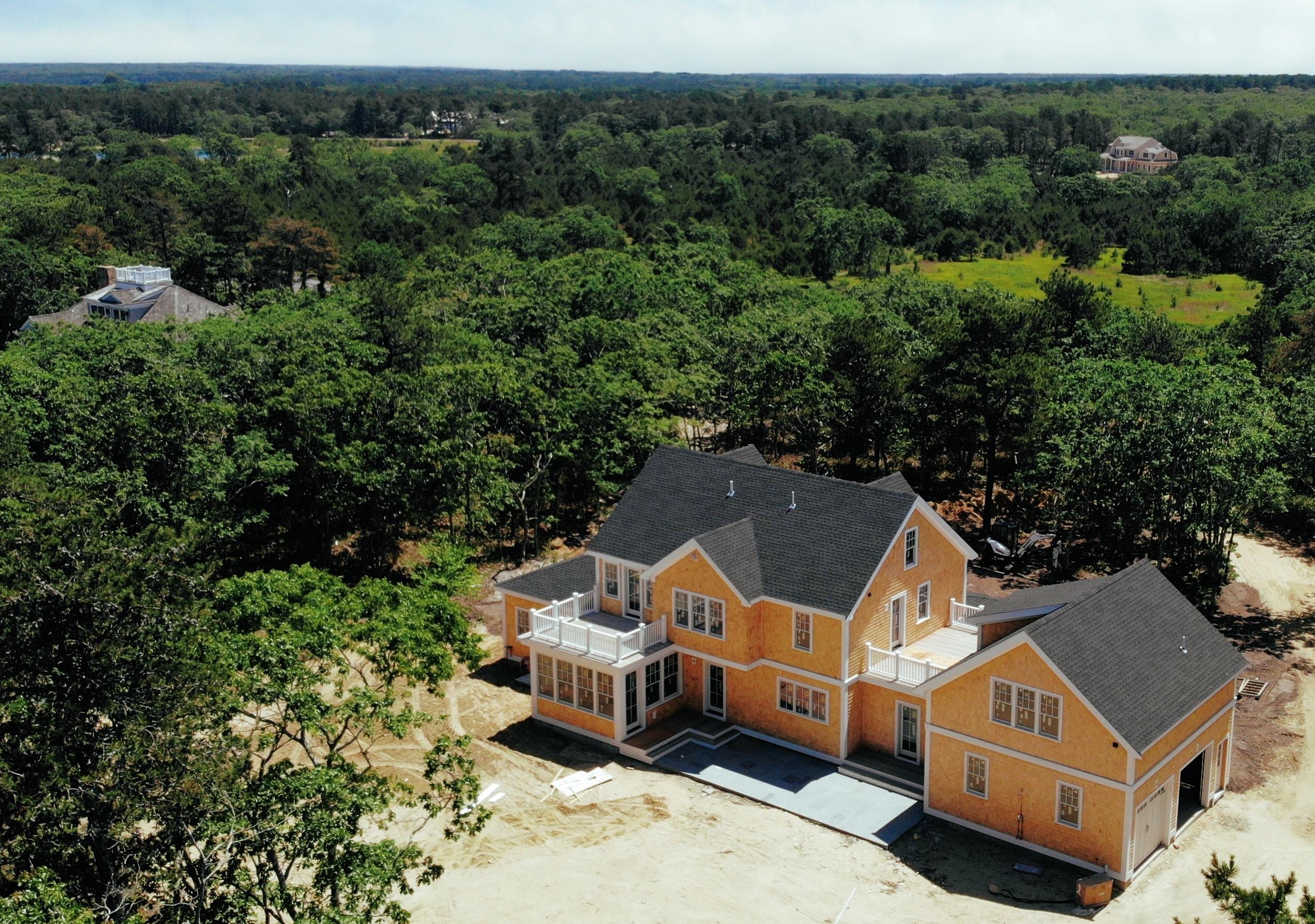 18 Paddock Road Oak Bluffs, MA 02557 - Photo 3 of 7 an aerial view of a house with a yard basket ball court and outdoor seating
