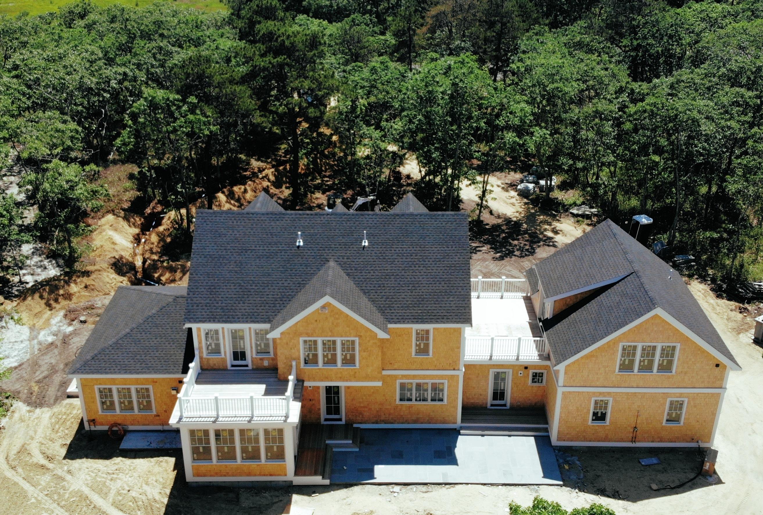 18 Paddock Road Oak Bluffs, MA 02557 - Photo 4 of 7 an aerial view of a house with a garden