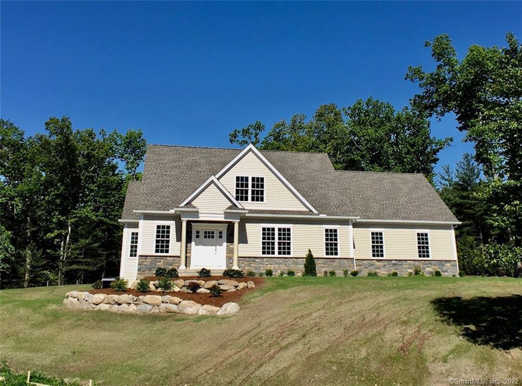 30 Stratton Farms Road Suffield, CT 06093 - Photo 1 of 1 a front view of a house with a garden