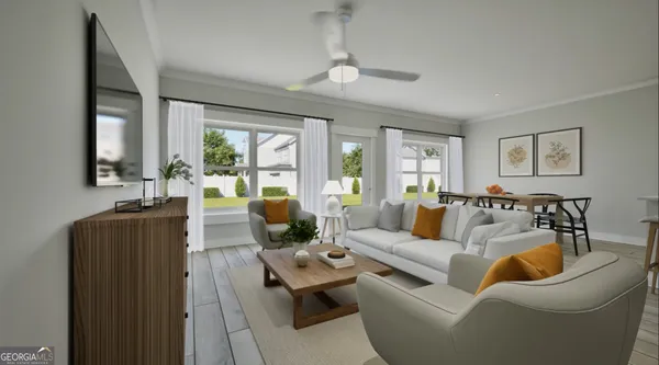 a living room with furniture fireplace and large windows