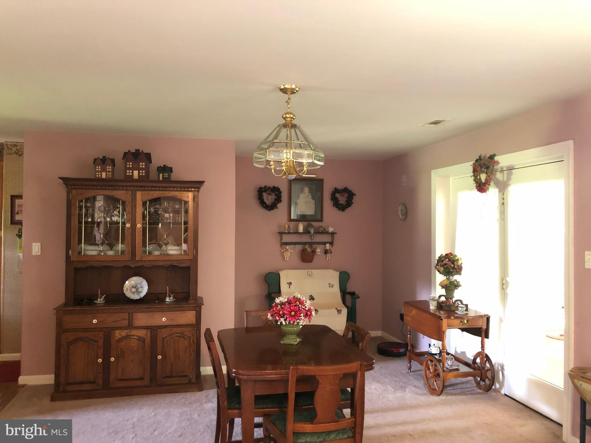 6906 Statum Road Preston, MD 21655 - Photo 8 of 21 Living dining Combo opens to Patio.