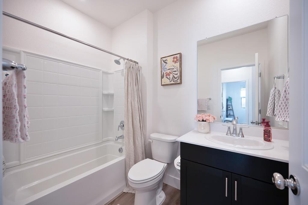 5301 East Commerce Way, Unit 32101 Sacramento, CA 95835 - Photo 27 of 41 a bathroom with a sink toilet and shower