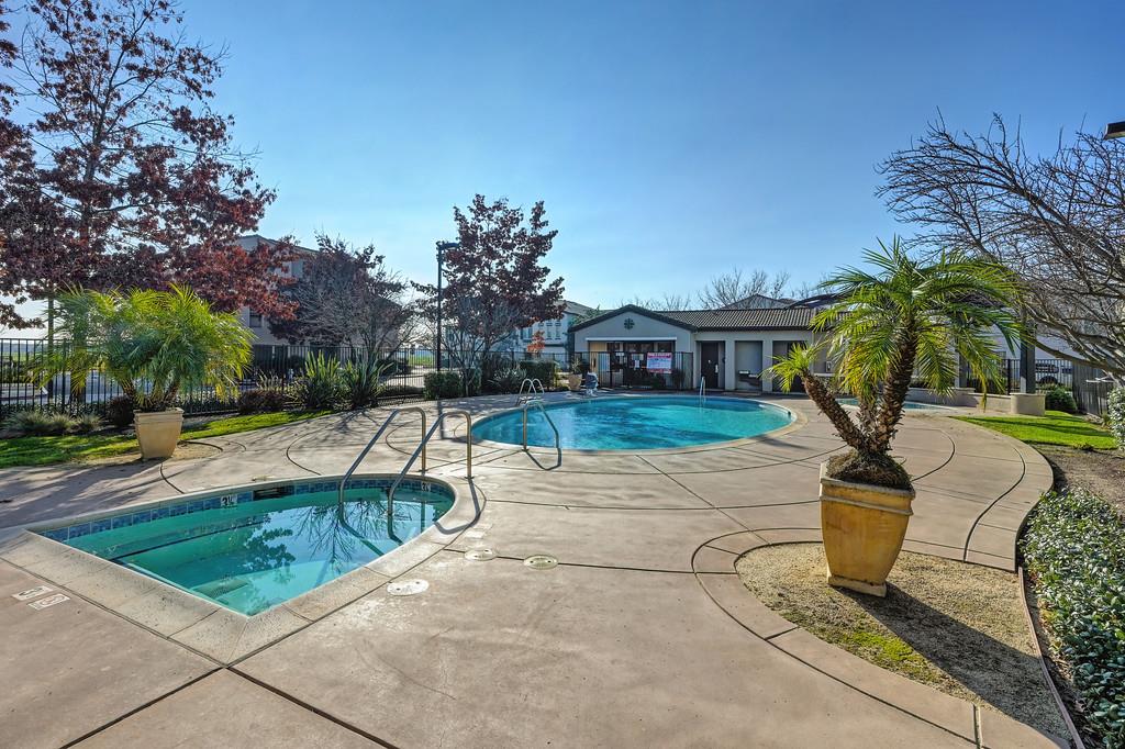 5301 East Commerce Way, Unit 32101 Sacramento, CA 95835 - Photo 39 of 41 a view of a swimming pool with a patio