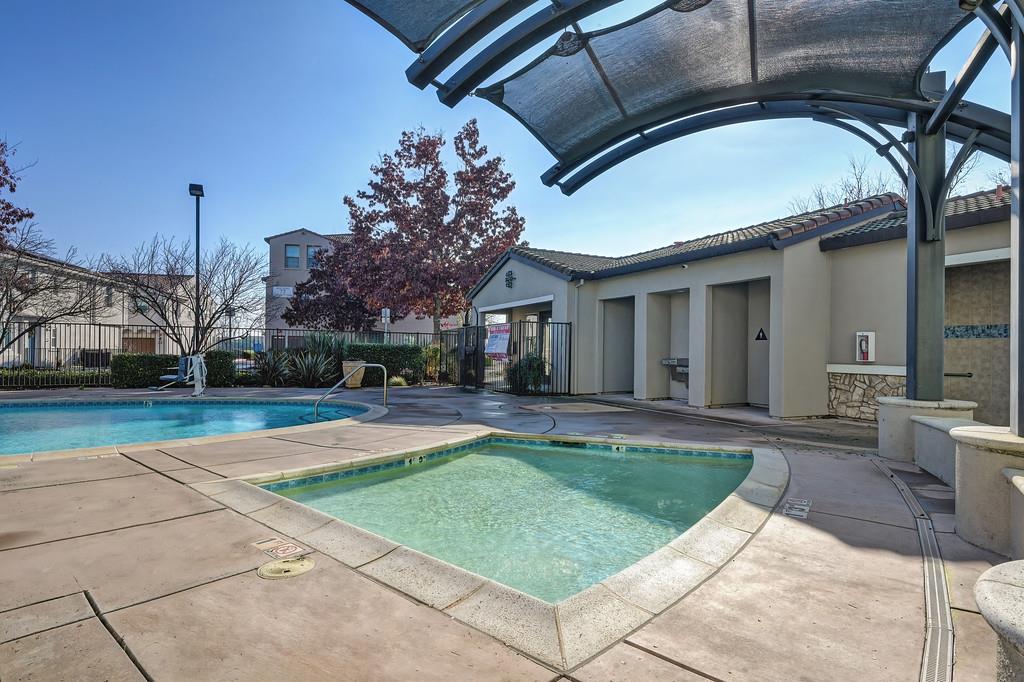5301 East Commerce Way, Unit 32101 Sacramento, CA 95835 - Photo 40 of 41 a view of a house with backyard and porch