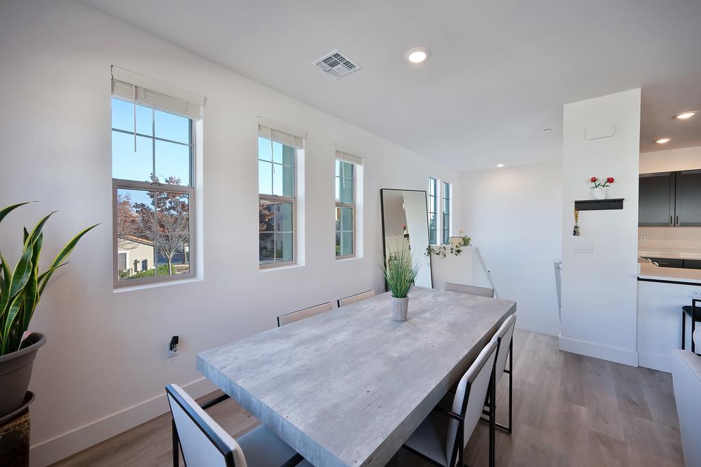 5301 East Commerce Way, Unit 32101 Sacramento, CA 95835 - Photo 10 of 41 a view of a dining room with furniture