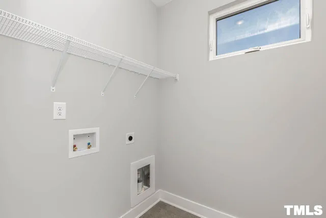 a kitchen with stainless steel appliances a white stove top oven and sink