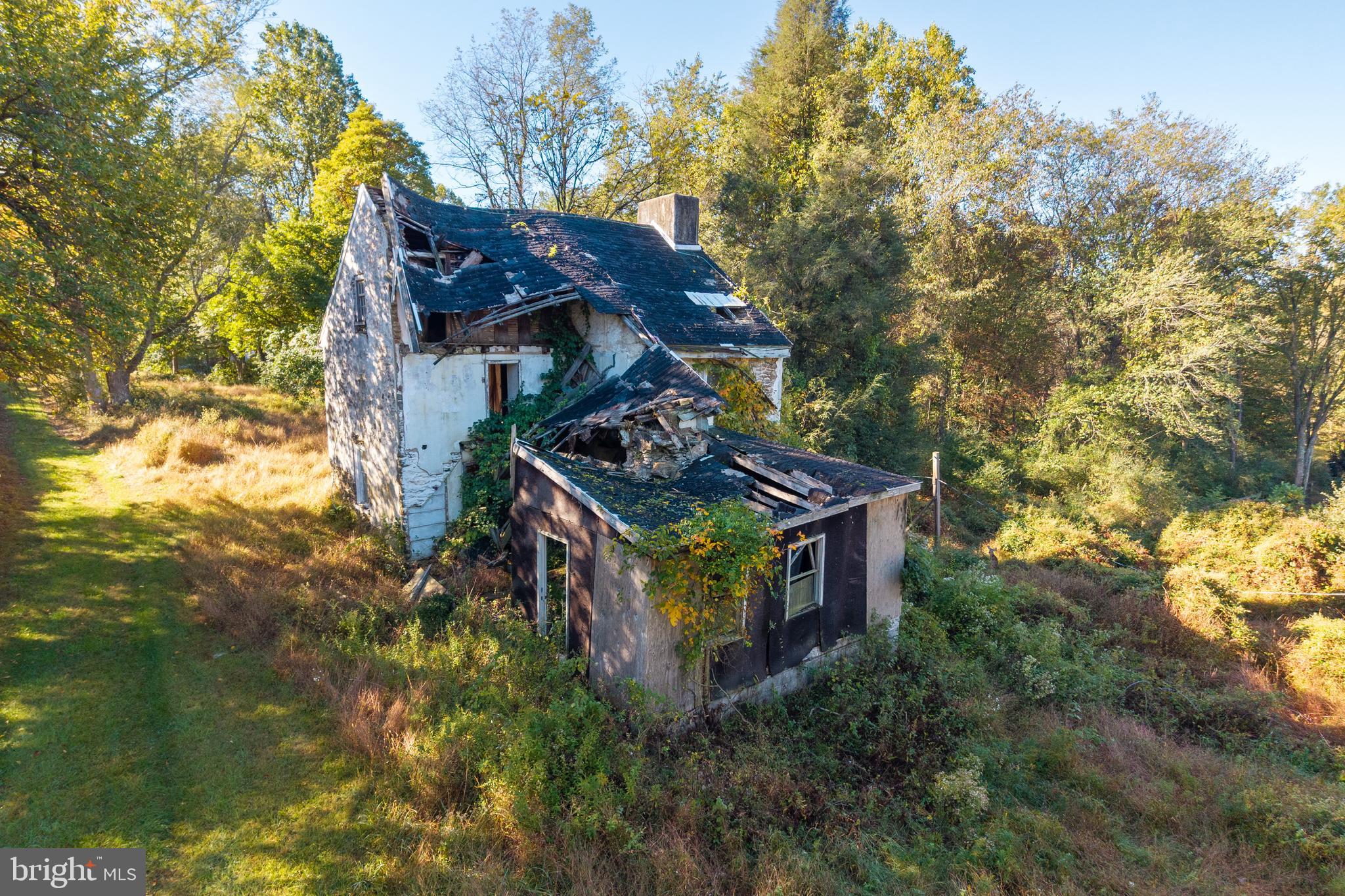 2275 Strasburg Road Coatesville, PA 19320 - Photo 11 of 29 a view of a wooden house with a yard