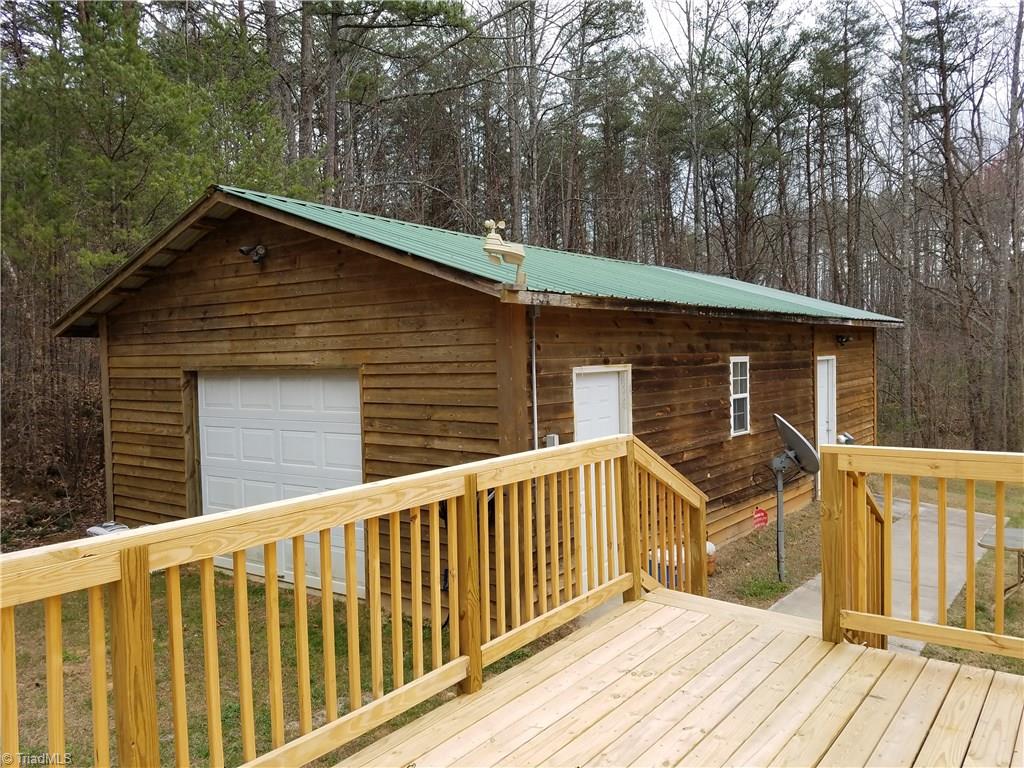 344 Prison Camp Road Dobson, NC 27017 - Photo 11 of 28 20 X 24 GARAGE WITH 12 X 20 ADDITION- INSULATED & WIRED-SECURITY SYSTEM-ONE ROOM HAS WALL HEAT PUMP FOR CLIMATE CONTROL