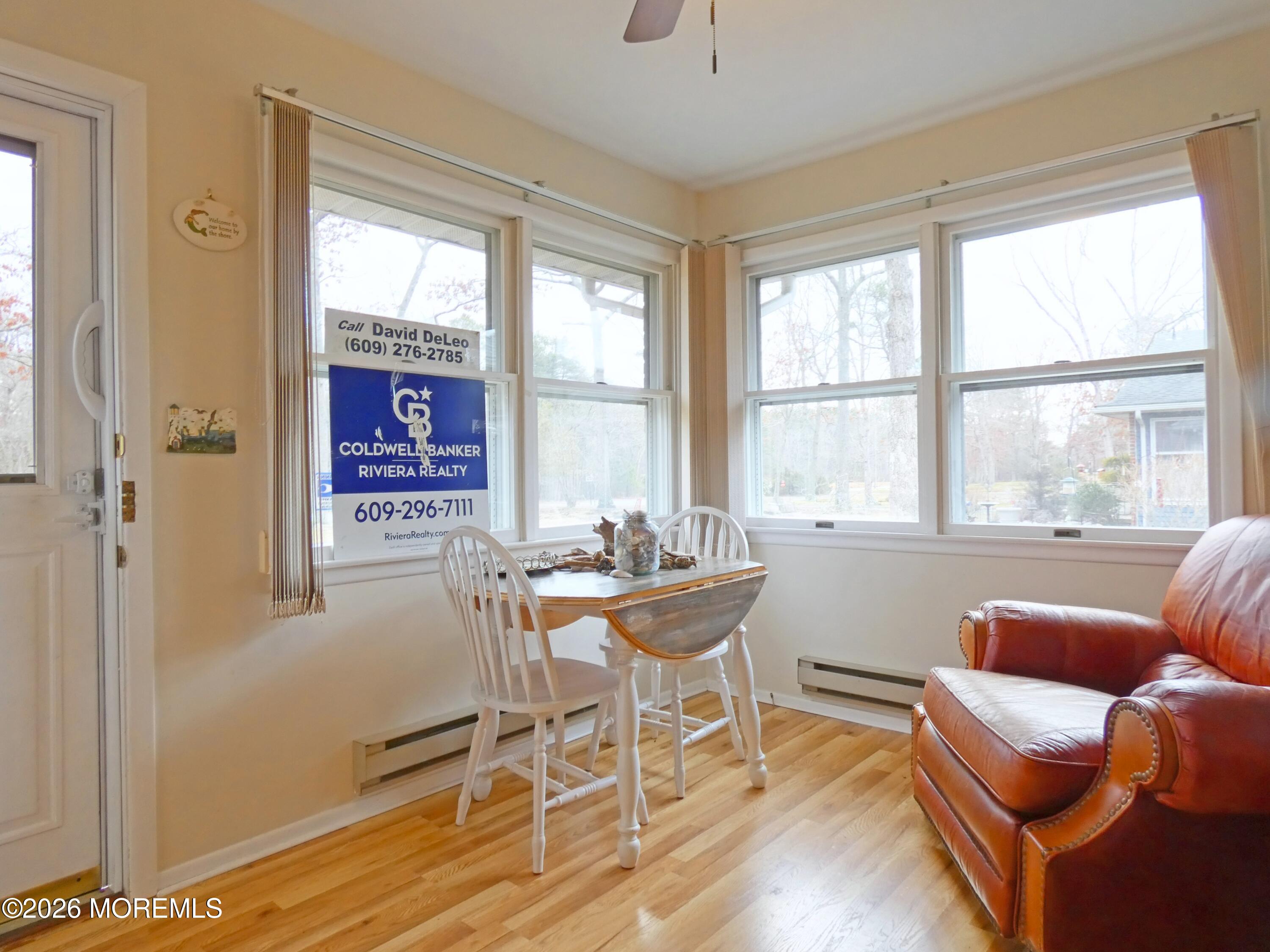 38 Cranberry Road Manahawkin, NJ 08050 - Photo 1 of 1 a dining room with furniture and wooden floor