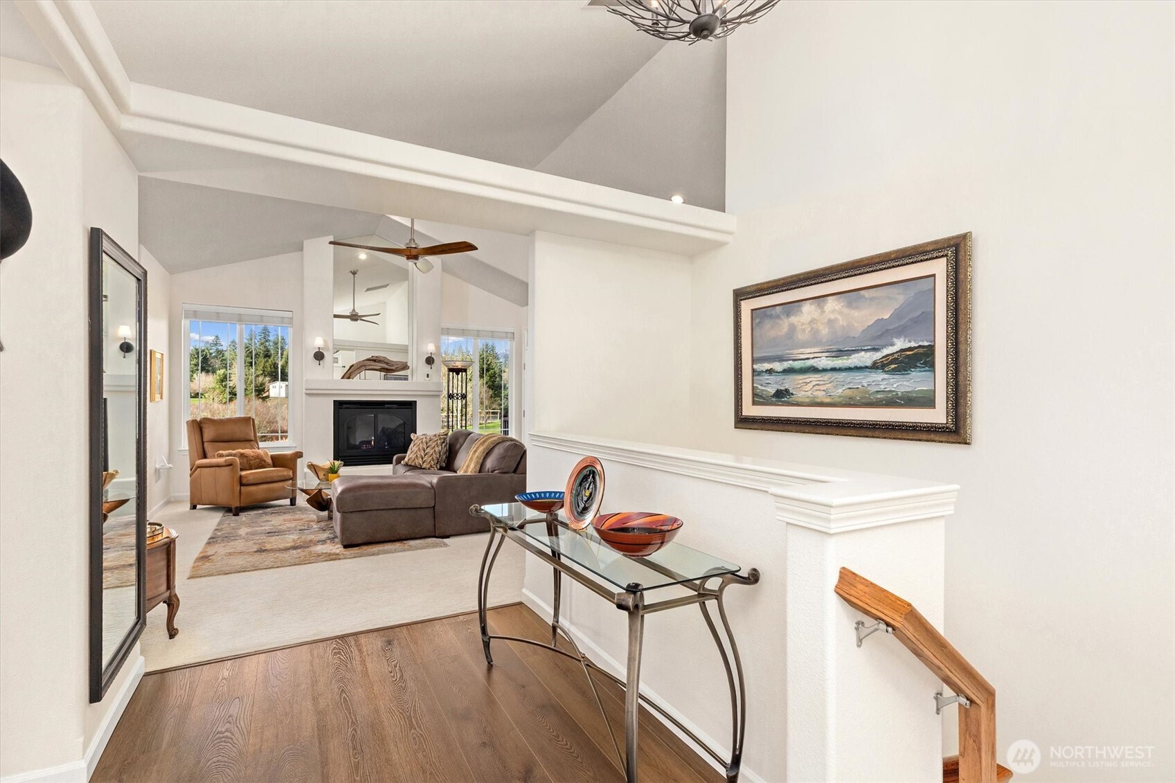 4946 Pleasant Glade Road Northeast Olympia, WA 98516 - Photo 6 of 38 a living room with furniture and a fireplace