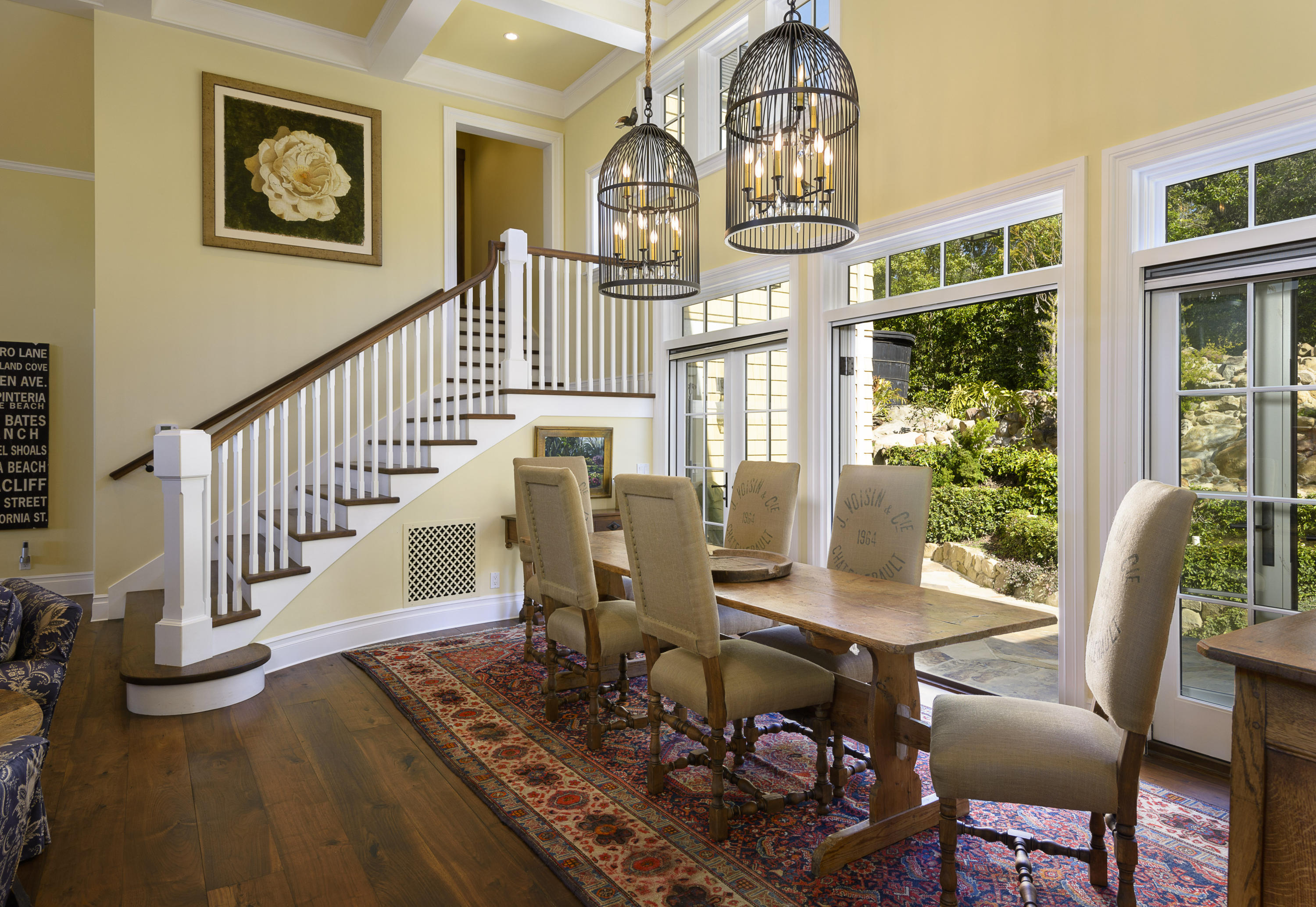 495 Toro Canyon Road Santa Barbara, CA 93108 - Photo 5 of 17 a view of a dining room with furniture a chandelier and wooden floor
