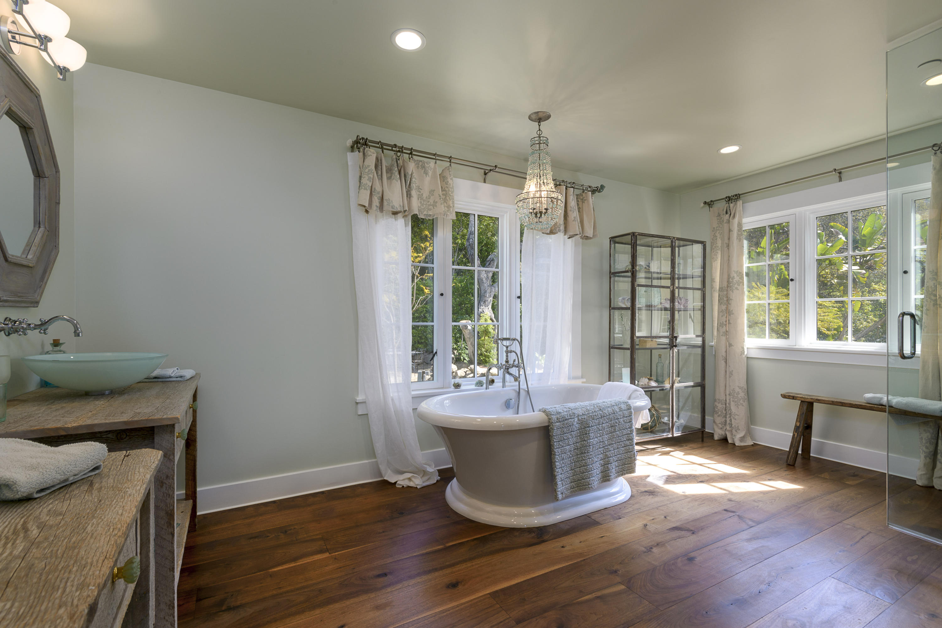 495 Toro Canyon Road Santa Barbara, CA 93108 - Photo 8 of 17 a room with wooden floor and window