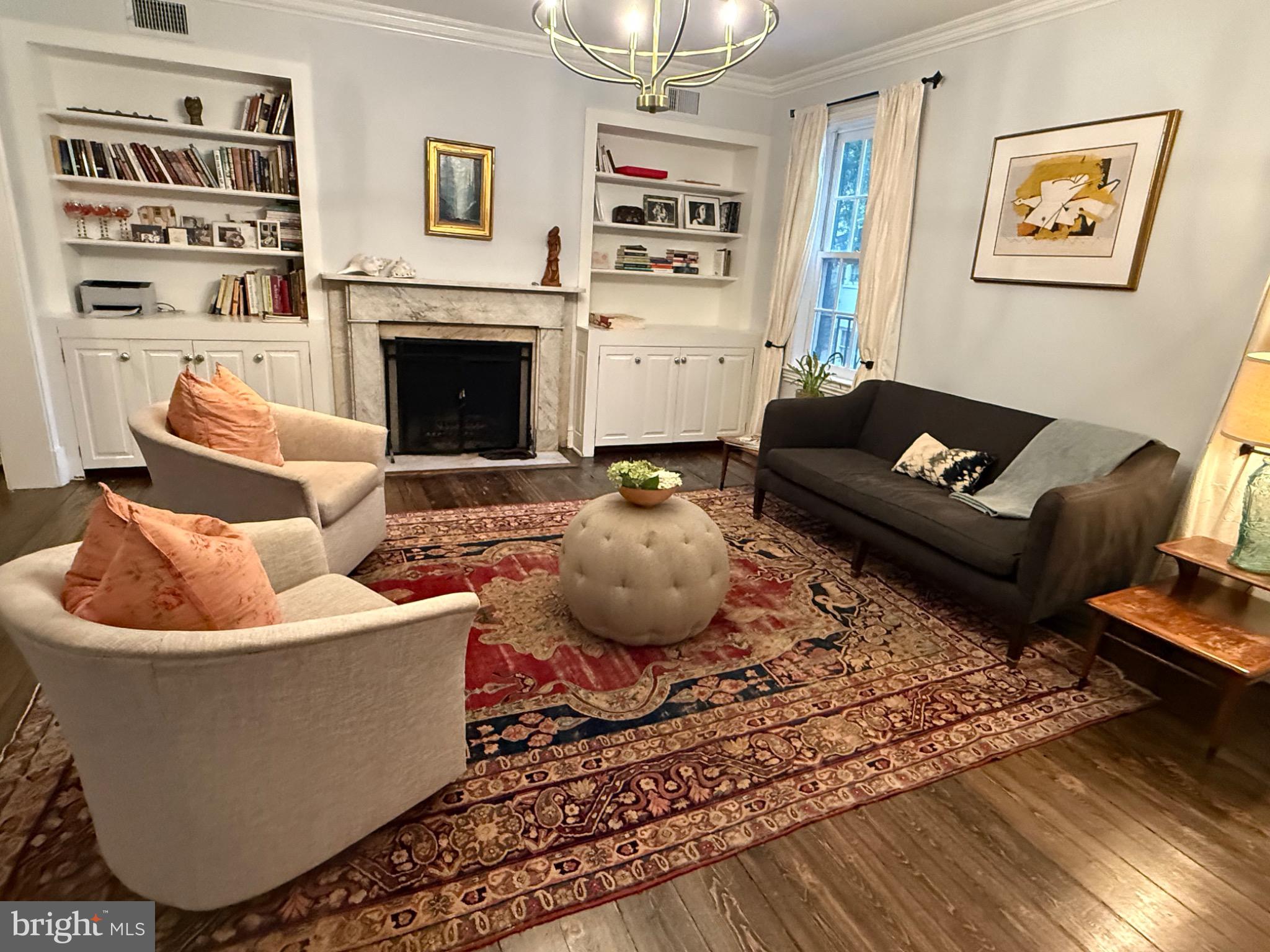 3409 O Street Northwest Washington, DC 20007 - Photo 2 of 9 Charming living room with classic elegance.