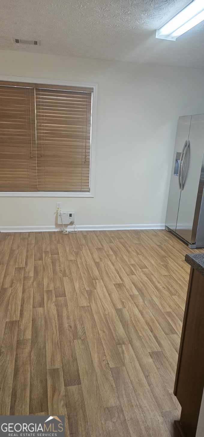 5000 Village Run Drive McDonough, GA 30252 - Photo 2 of 7 a view of wooden floor